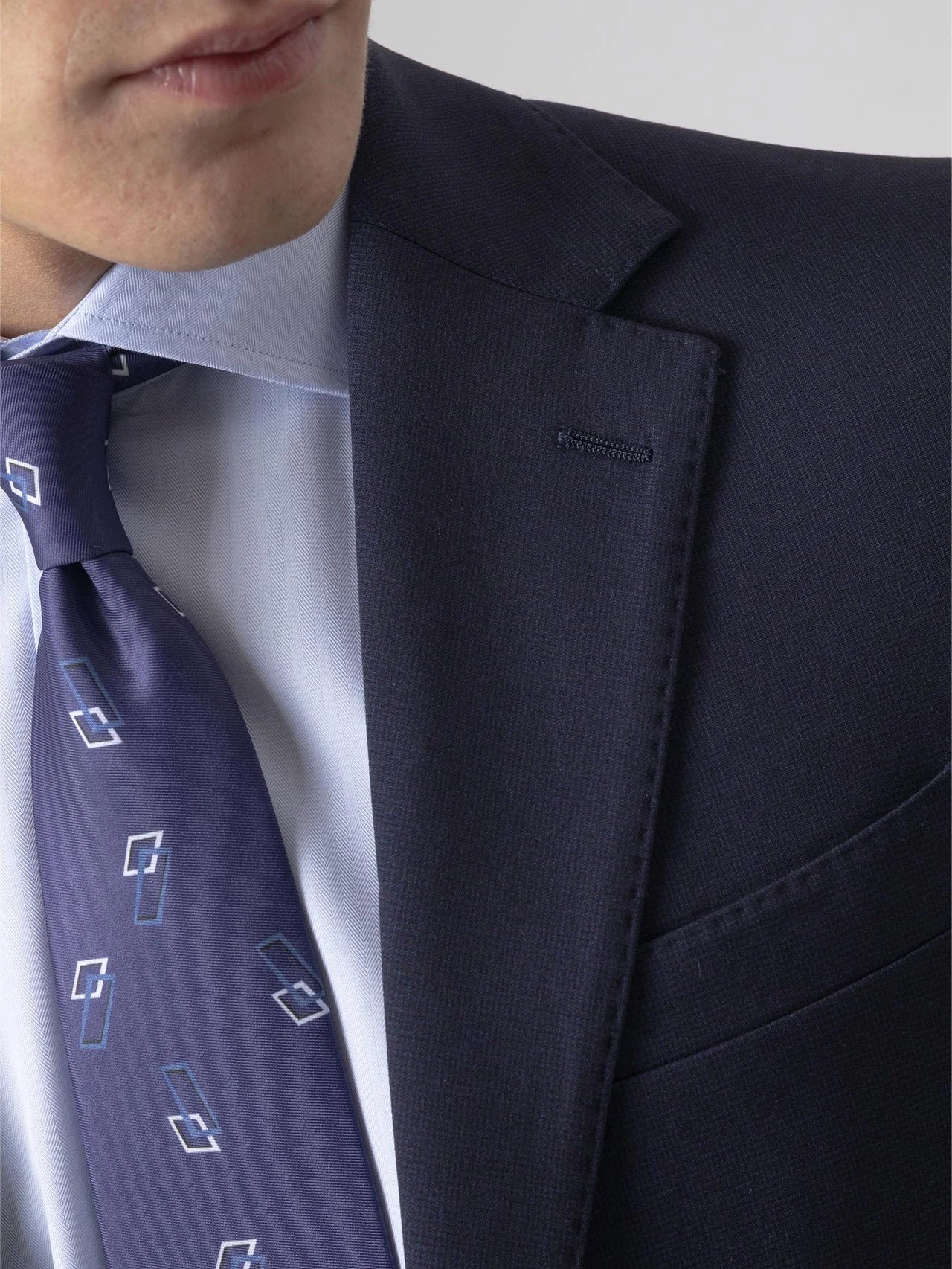 TRAJE MICRO CUADRO MARINO