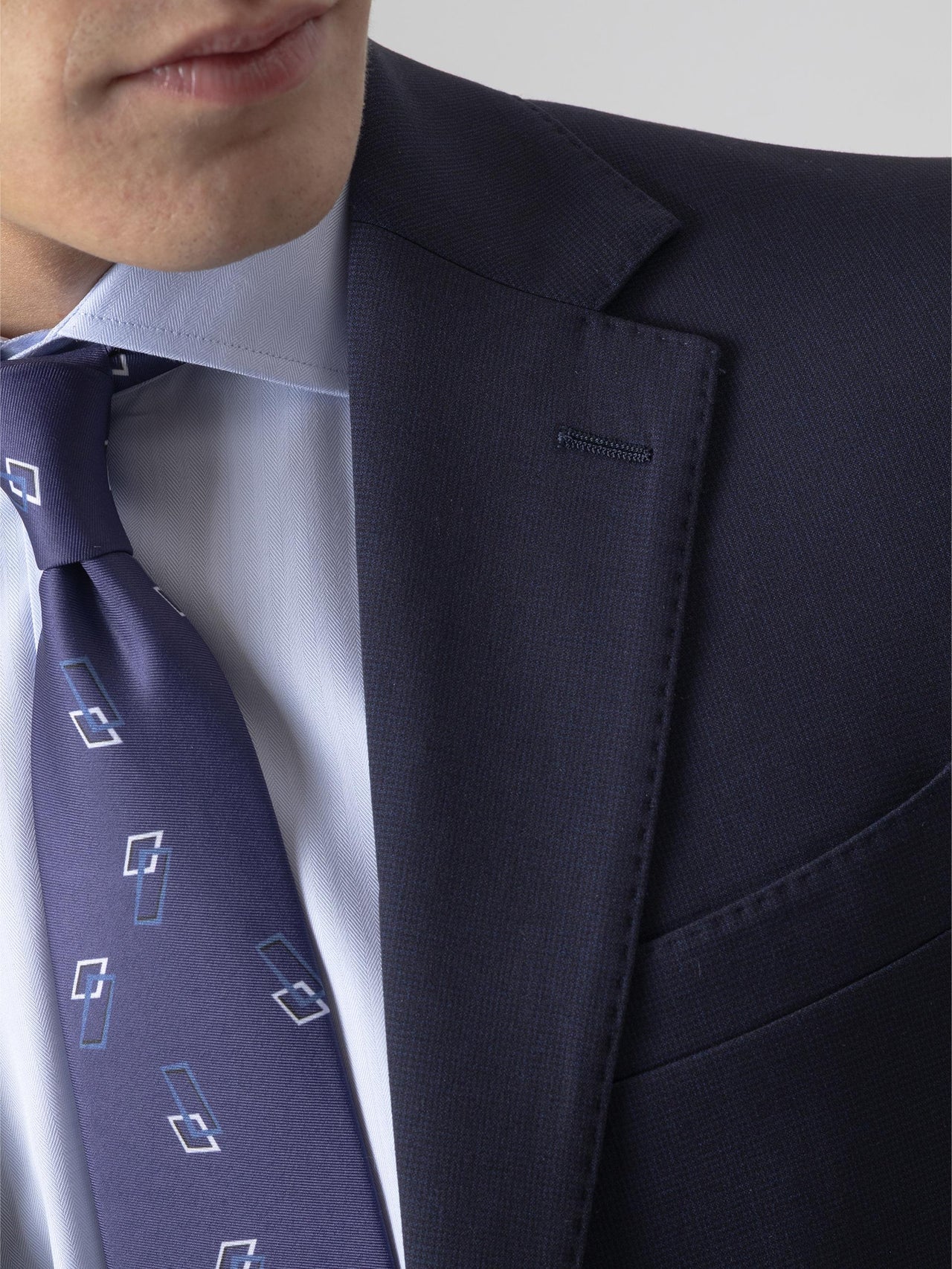 TRAJE MICRO CUADRO MARINO